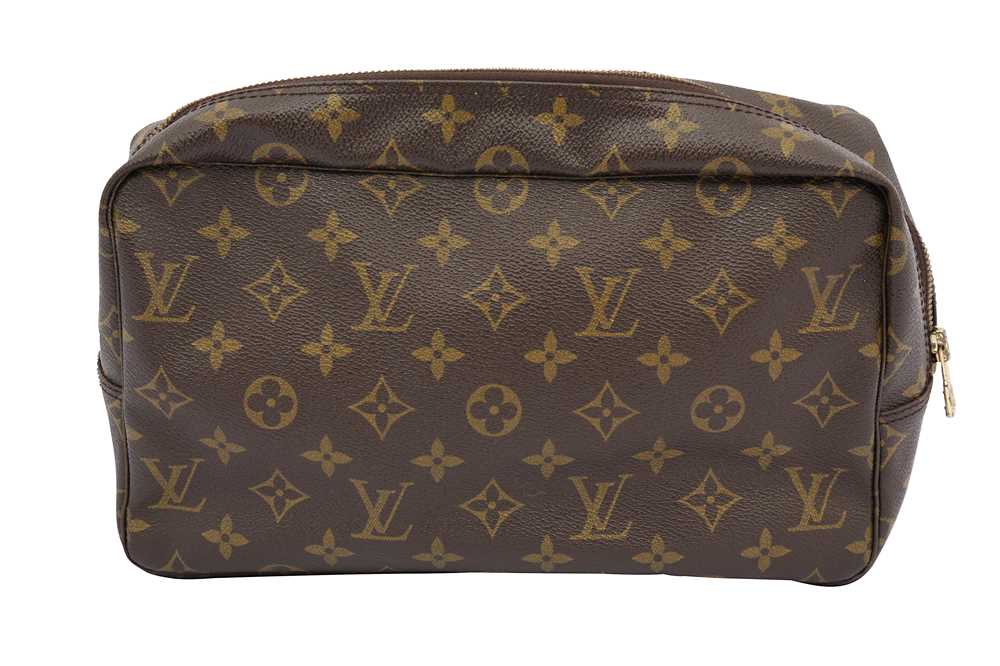 Sold at Auction: Louis Vuitton Coated Canvas Toiletry Pouch GM