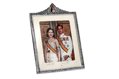 Lot 154 - A large late 20th century Thai Royal presentation silver, niello, gold and enamel photograph frame, Bangkok circa 1987 by Thai Nakon