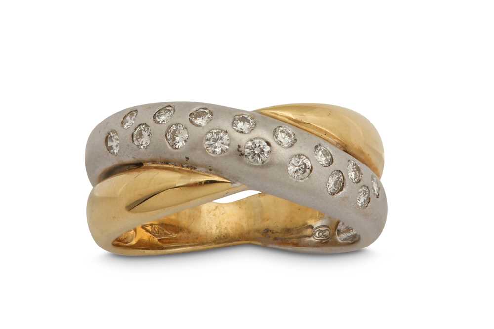 Lot 1268 - A diamond crossover ring