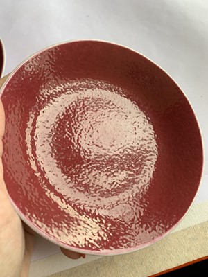 Lot 81 - A SET OF SIX CHINESE COPPER-RED GLAZED SAUCER DISHES.
