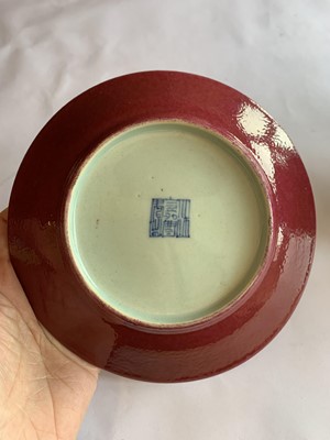 Lot 77 - A SET OF TEN CHINESE COPPER RED-GLAZED DISHES.