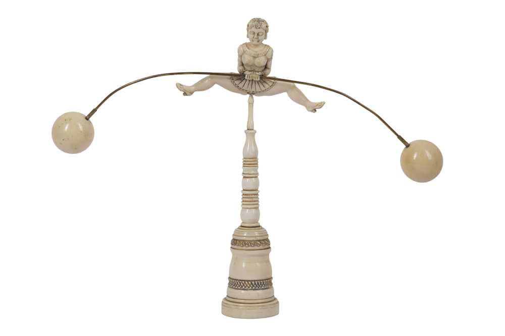 Lot 83 - A VERY RARE LATE 19TH CENTURY CARVED IVORY EROTIC BALANCING AMUSEMENT
