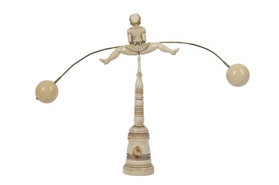 Lot 83 - A VERY RARE LATE 19TH CENTURY CARVED IVORY EROTIC BALANCING AMUSEMENT