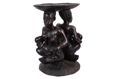 Lot 361 - A WEST AFRICAN TRIBAL CARVED HARDWOOD MATERNITY FIGURE STOOL / TABLE