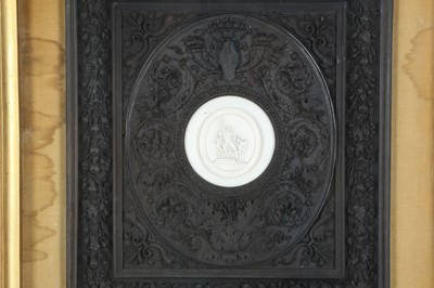 Lot 317 - A 19TH CENTURY CARVED IVORY RELIEF AFTER THE ANTIQUE OF THE LAOCOON, IN A WALNUT FRAME