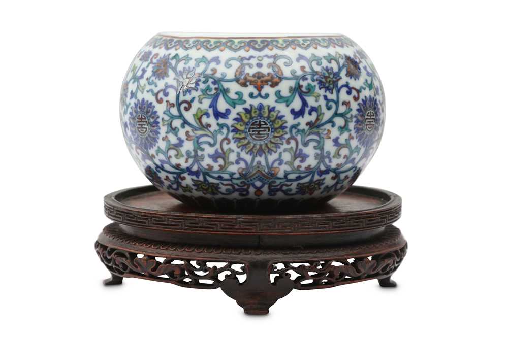 Lot 615 - A CHINESE DOCAI WALL 'LOTUS' VASE.