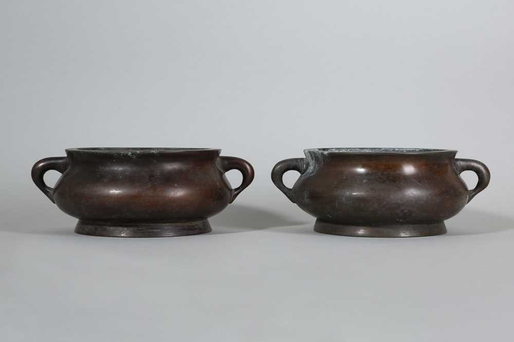 Lot 134 - A PAIR OF CHINESE BRONZE INCENSE BURNERS.