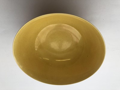 Lot 965 - A CHINESE YELLOW-GLAZED BOWL.