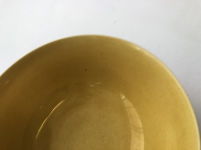 Lot 965 - A CHINESE YELLOW-GLAZED BOWL.