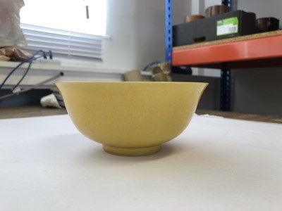 Lot 965 - A CHINESE YELLOW-GLAZED BOWL.