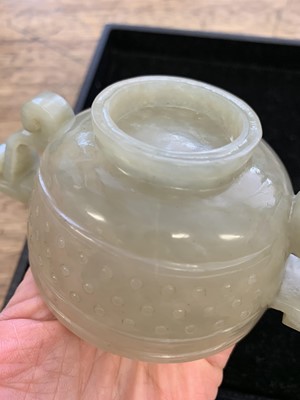 Lot 92 - A CHINESE PALE CELADON JADE CUP.