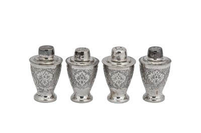 Lot 210 - A set of four mid-20th century Iranian (Persian) silver cruets, Isfahan circa 1960 mark of Bagher Parvaresh (c.1910-1978, master 1928)