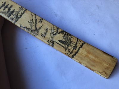 Lot 541 - λ A CHINESE IVORY ENGRAVED BATON, HU.