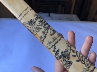 Lot 541 - λ A CHINESE IVORY ENGRAVED BATON, HU.