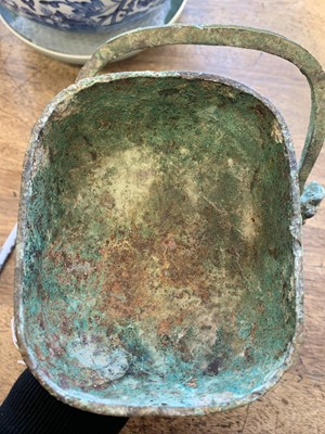 Lot 110 - A CHINESE BRONZE RITUAL VESSEL AND COVER, YOU.