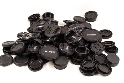 Lot 435 - Around 80 Nikon Camera Body Caps & Lens Caps