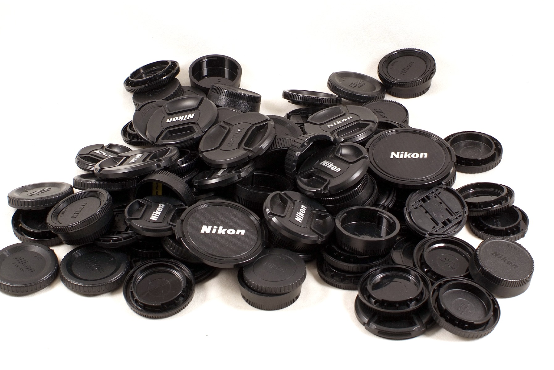 Lot 435 Around 80 Nikon Camera Body Caps & Lens Caps