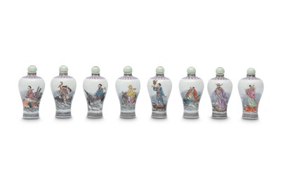 Lot 723 - A SET OF EIGHT CHINESE FAMILLE ROSE 'IMMORTALS' SNUFF BOTTLES.
