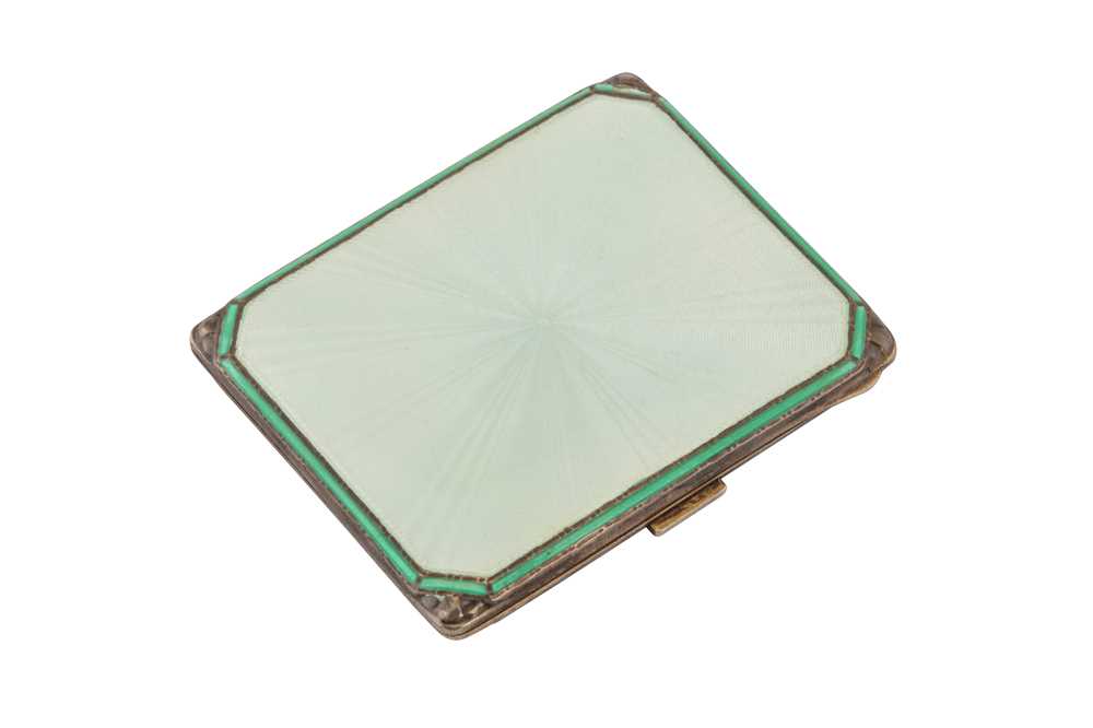 Lot 54 - Egyptian Royal interest – A George VI art deco guilloche enamel sterling silver gold set cigarette case, Birmingham 1939 by Adie Brothers