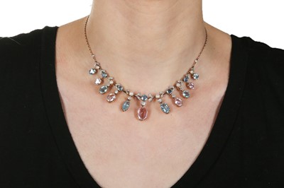 Lot 1210 - A pink topaz, aquamarine, pearl and diamond necklace, circa 1910