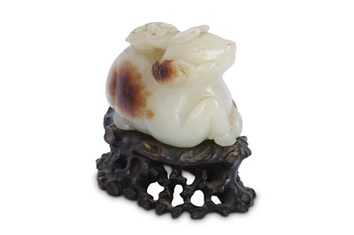 Lot 331 - A CHINESE WHITE JADE CARVING OF A DEER.