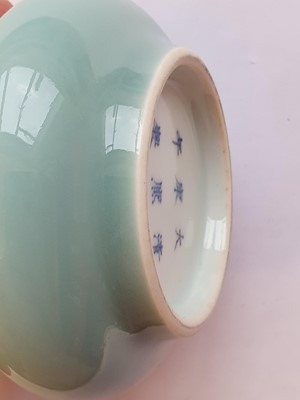 Lot 138 - A CHINESE BLUE-GLAZED WASHER.