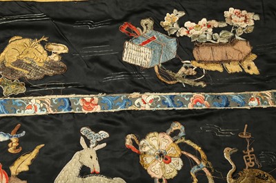 Lot 378 - A CHINESE BLACK-GROUND EMBROIDERED SILK ALTAR HANGING.