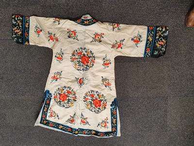 Lot 739 - THREE CHINESE EMBROIDERED SILK ROBES.