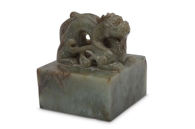 Lot 540 - A CHINESE PALE CELADON JADE SEAL.