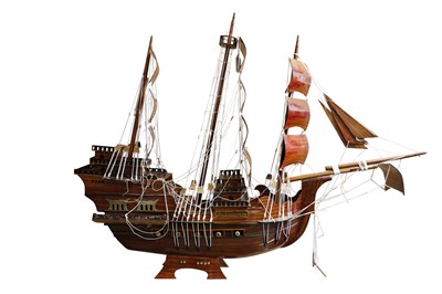 Lot 123 - A LARGE LACQUERED HARDWOOD MODEL OF A GALLEON