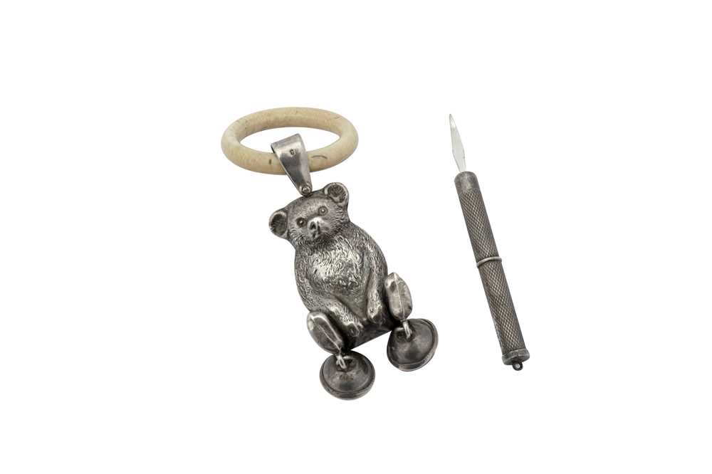 Lot 117 - A George V sterling silver novelty babies rattle, Birmingham 1919 by William Vale & Sons