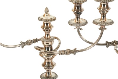 Lot 150 - A pair of 19th century Old Sheffield plate three light candelabra