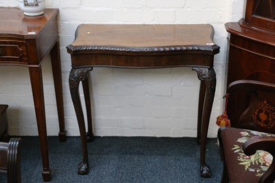 Lot 465 - A 1930s walnut fold-over card table with...