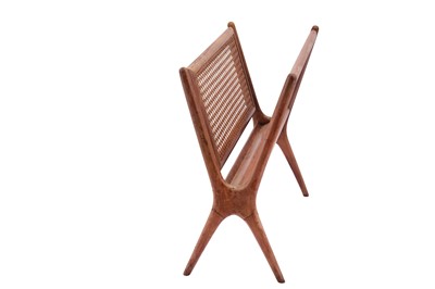 Lot 148 - ITALY: a wicker magazine rack, circa 1960s / 70s