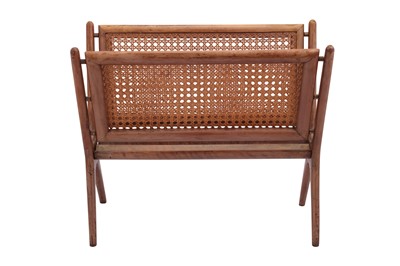 Lot 148 - ITALY: a wicker magazine rack, circa 1960s / 70s