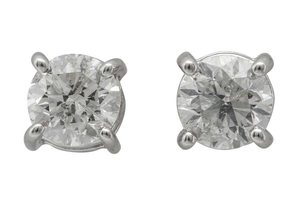 Lot 1293 - A pair of diamond earstuds