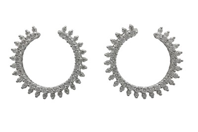 Lot 1259 - A pair of diamond earrings