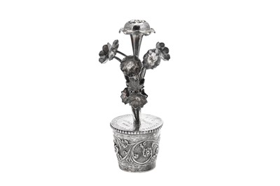 Lot 135 - An early 20th century Indian unmarked silver model of flowers in a pot, circa 1930