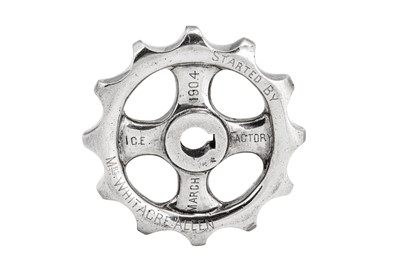 Lot 140 - An early 20th century Indian Colonial silver cased steel presentation wheel cog, circa 1904