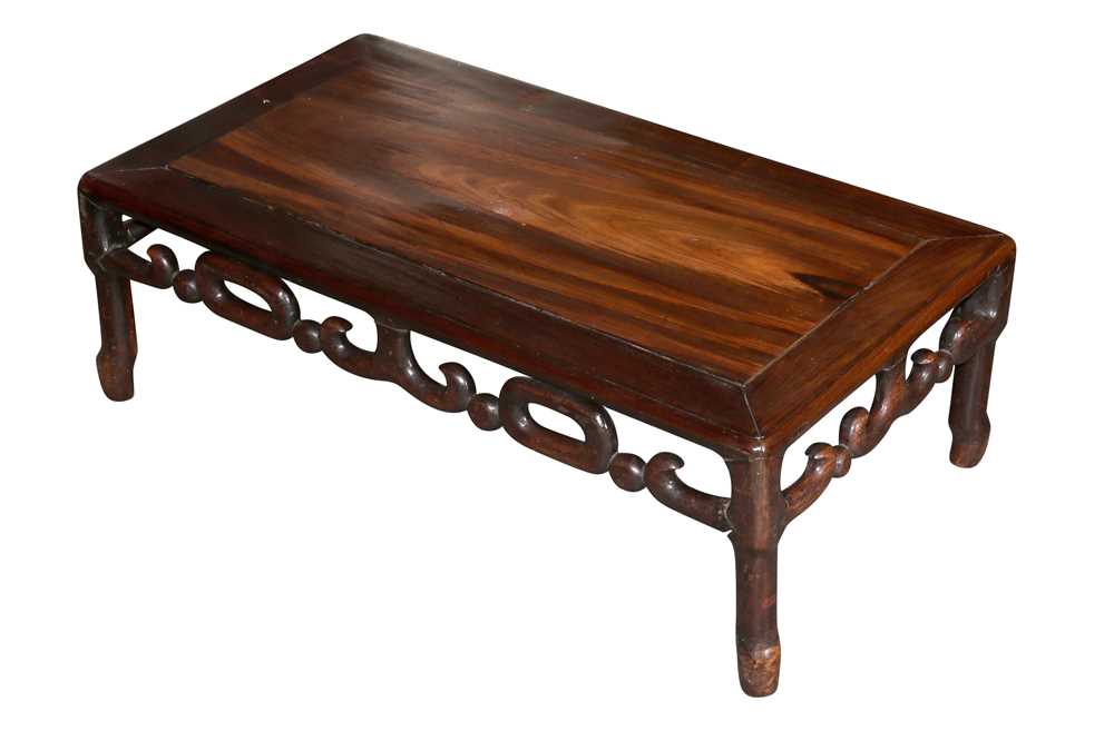 Lot 672 - A 19th Century Chinese rosewood low table