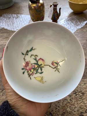 Lot 645 - A CHINESE FAMILLE ROSE RUBY-GROUND 'LOTUS' BOWL.