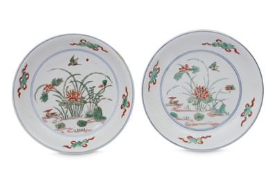 Lot 717 - A PAIR OF CHINESE FAMILLE VERTE 'LOTUS POND' DISHES.