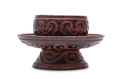 Lot 628 - A TIXI LACQUER CUP STAND.