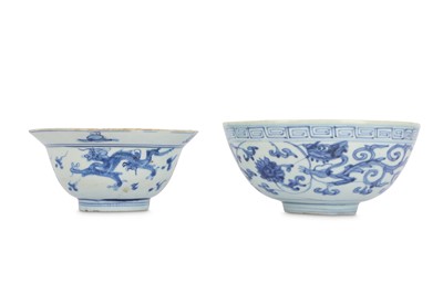 Lot 566 - TWO CHINESE BLUE AND WHITE 'DRAGON' BOWLS.