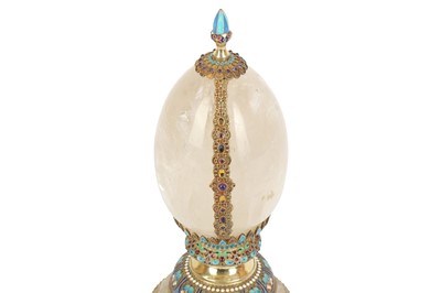 Lot 536 - A late 20th / early 21st century rock crystal style and enamel egg ornament