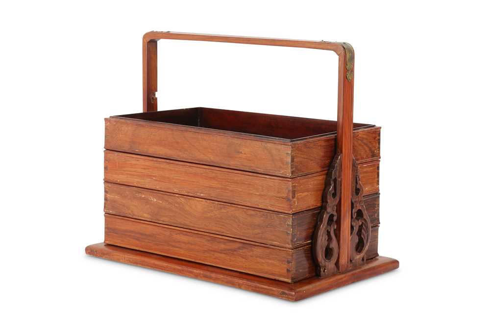 Lot 253 - A CHINESE WOOD TIERED PICNIC BOX.