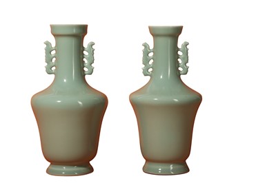 Lot 558 - A PAIR OF CHINESE CELADON-GLAZED VASES.