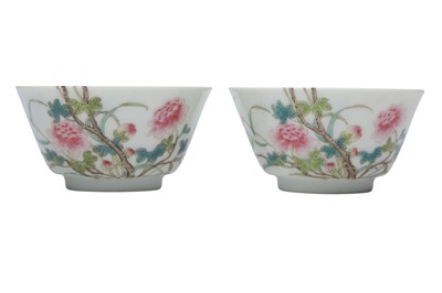 Lot 636 - A PAIR OF CHINESE FAMILLE ROSE 'PEONIES' CUPS.