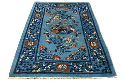 Lot 15 - A CHINESE LARGE RUG