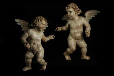 Lot 26 - A PAIR OF LATE 17TH / EARLY 18TH CENTURY SOUTH GERMAN CARVED AND PAINTED WOOD PUTTI
